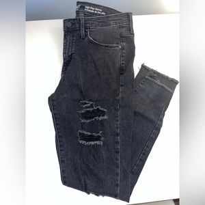 Black distressed skinny jeans in size 8!